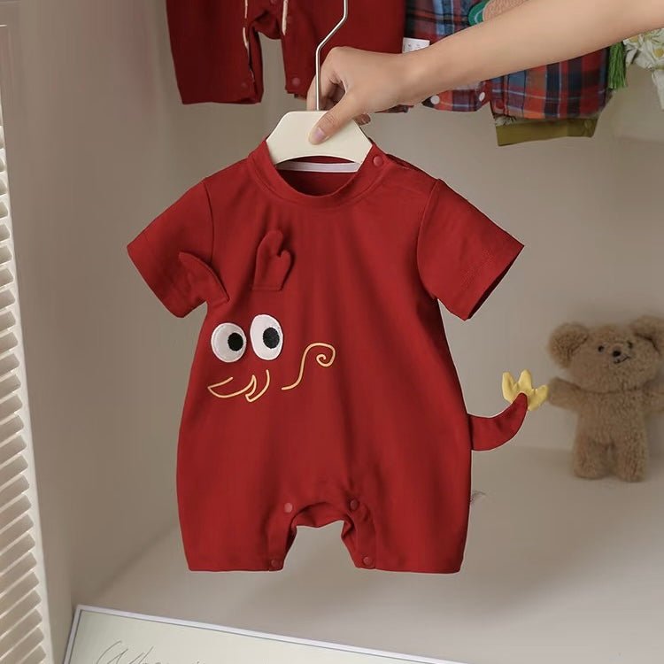 Red baby romper with short sleeves by Ashberryco, featuring 3D ears, patched eyes, gold dragon silhouette, and a short dragon tail, ideal for Baby 100 Days in New York and San Francisco.