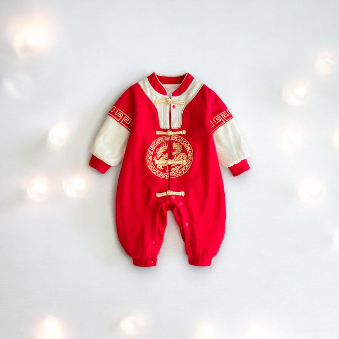 A red dragon baby one-piece romper with gold embroidery by Ashberryco, a festive baby boy new years outfit that embodies meaningful cultural heritage into all the festivities!