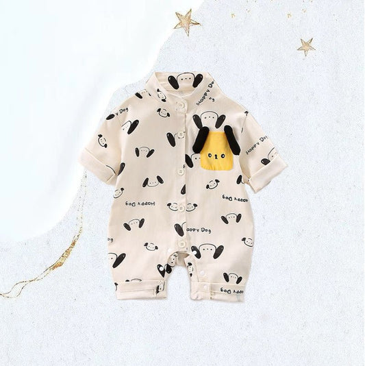 Yellow baby romper with puppy dog prints and short sleeves from Ashberryco, designed for comfort and style in warm weather!